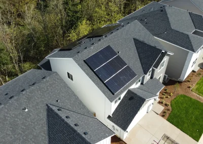 Picture of a house with solar panels on the roof. Nice neighborhood in Happy Valley, Oregon.